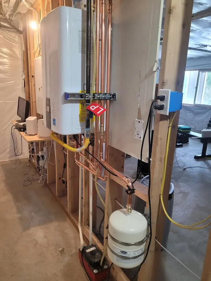 Licensed plumber repairing a kitchen sink in Melvindale