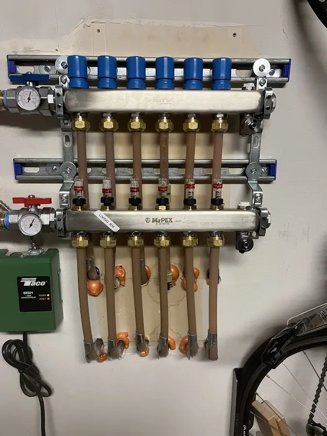 Plumber performing Water Heater Repair at a residential property in Melvindale